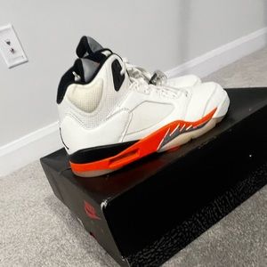 Selling new Jordan 5s in cream and orange